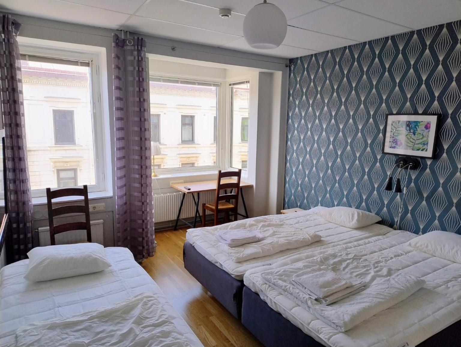 Dreibettzimmer mit Gemeinschaftsbad